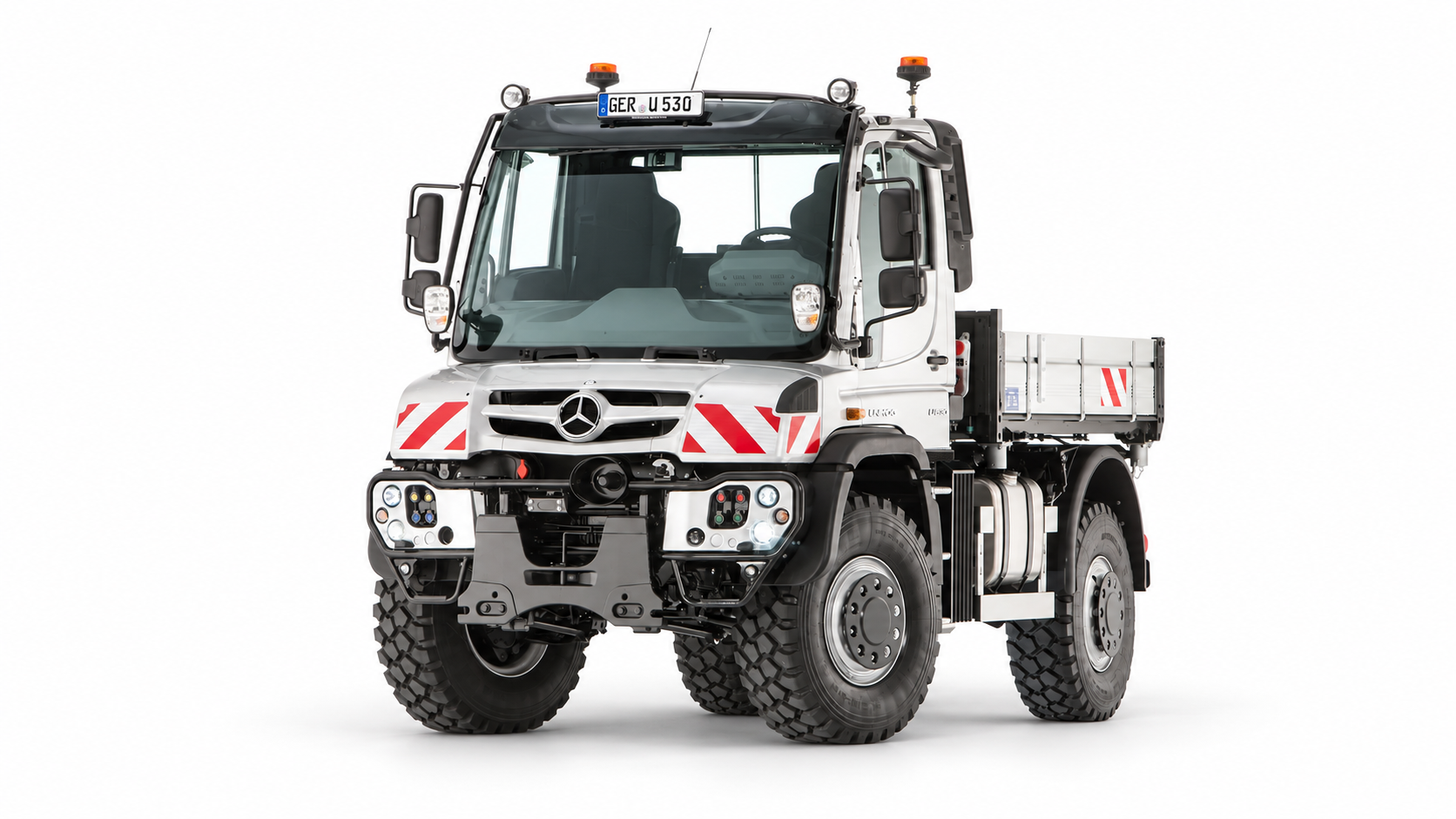 Mercedes Unimog with dropside cargo bed — edited supplied photograph